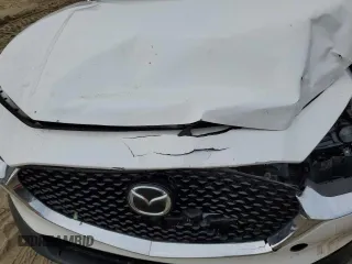 2021 Mazda CX-30 Select z VIN 3MVDMBBL1MM213629, wystawiony jako Copart lot #83900164 z przebiegiem 138 084 mil mil oraz Nie do naprawy • Non repairable. Historia ofert i sprzedaży dostępna na DreamBid. Obrazek 13.