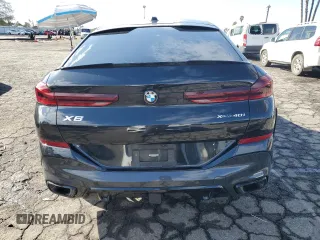 2024 BMW X6 xDrive40i with VIN 5UX33EX09R9S35818, listed as a Copart auction lot 89089515 with 26,955 mi miles and Salvage Title. Bid and sale history available at carsss.com. Image 6.