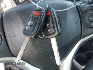 2020 Honda Fit LX with VIN 3HGGK5H46LM725764, listed as a IAAI auction lot 42499144 with 79,758 mi miles and . Bid and sale history available at DreamBid. Image 11.