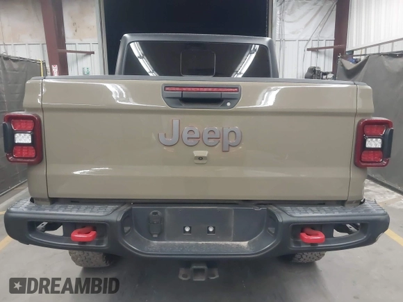 2020 Jeep Gladiator Rubicon z VIN 1C6JJTBGXLL178893, wystawiony jako IAAI lot #42206863 z przebiegiem 29 138 mil mil oraz . Historia ofert i sprzedaży dostępna na DreamBid. Obrazek 17.