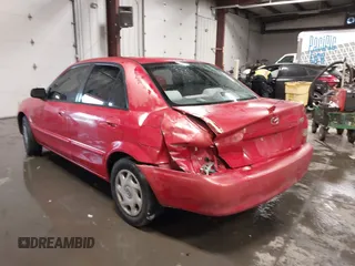 2000 Mazda Protege DX with VIN JM1BJ2220Y0258658, listed as a IAAI auction lot 41622579 with 276,682 mi miles and . Bid and sale history available at DreamBid. Image 3.