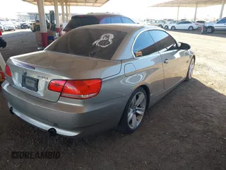 2007 BMW 3 Series 335i with VIN WBAWL73517PX46117, listed as a IAAI auction lot 40208424 with 117,045 mi miles. Bid and sale history available at carsss.com. Image 4.