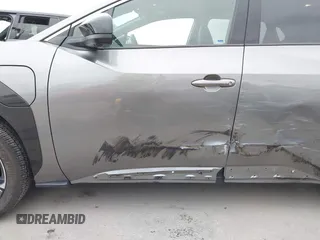 2024 Toyota bZ4X XLE z VIN JTMABACA9RA064702, wystawiony jako IAAI lot #42064771 z przebiegiem 9689 mil mil oraz . Historia ofert i sprzedaży dostępna na DreamBid. Obrazek 6.
