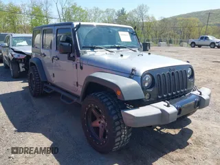 2015 Jeep Wrangler Unlimited Sport z VIN 1C4BJWDG6FL768265, wystawiony jako IAAI lot #42150124 z przebiegiem 85 108 mil mil oraz . Historia ofert i sprzedaży dostępna na DreamBid. Obrazek 1.