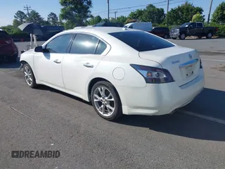 2014 Nissan Maxima S with VIN 1N4AA5AP2EC909749, listed as a IAAI auction lot 42456426 with 185,554 mi miles and . Bid and sale history available at DreamBid. Image 3.