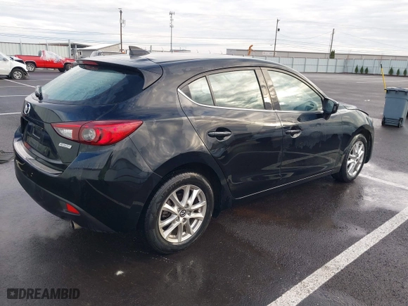 2016 Mazda Mazda3 i Grand Touring with VIN JM1BM1N74G1279692, listed as a IAAI auction lot 41164751 with 93,535 mi miles. Bid and sale history available at carsss.com. Image 4.