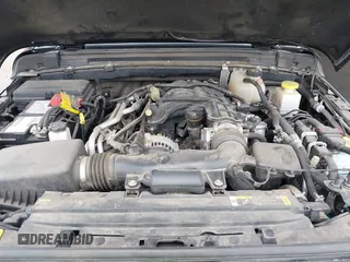 2023 Jeep Gladiator High Altitude z VIN 1C6HJTFG5PL552826, wystawiony jako IAAI lot #42288319 z przebiegiem 55 165 mil mil oraz . Historia ofert i sprzedaży dostępna na DreamBid. Obrazek 10.