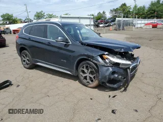 2018 BMW X1 xDrive28i with VIN WBXHT3C36J5F89230, listed as a Copart auction lot 62904545 with 170,860 mi miles and Salvage title. Bid and sale history available at DreamBid. Image 4.