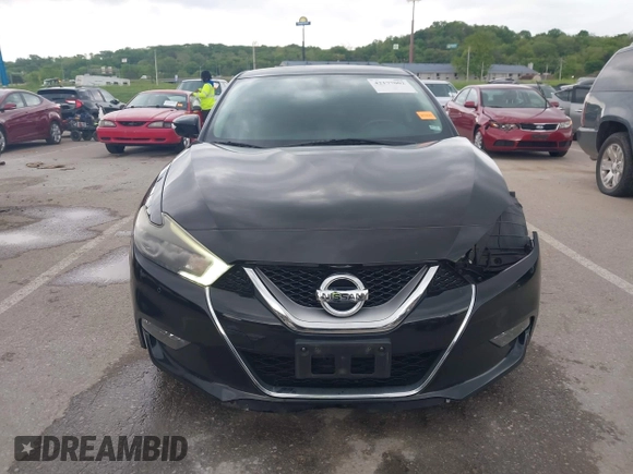 2017 Nissan Maxima Platinum z VIN 1N4AA6AP4HC403592, wystawiony jako IAAI lot #42177002 z przebiegiem 112 105 mil mil oraz . Historia ofert i sprzedaży dostępna na DreamBid. Obrazek 13.