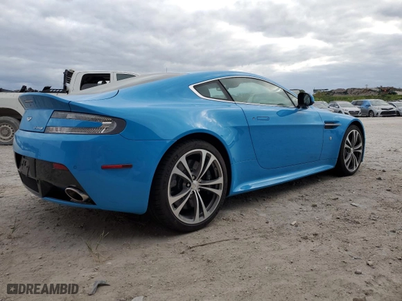 2011 Aston Martin V12 Vantage Carbon Black with VIN SCFEBBCF6BGS00579, listed as a Copart auction lot 79911294 with 34,191 mi miles and Salvage Title. Bid and sale history available at carsss.com. Image 3.