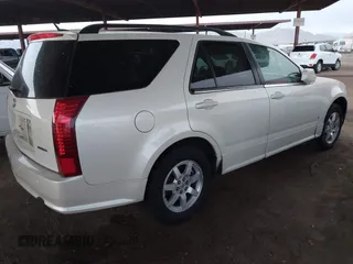 2008 Cadillac SRX AWD with VIN 1GYEE637X80102608, listed as a IAAI auction lot 41451221 with 151,552 mi miles. Bid and sale history available at carsss.com. Image 4.