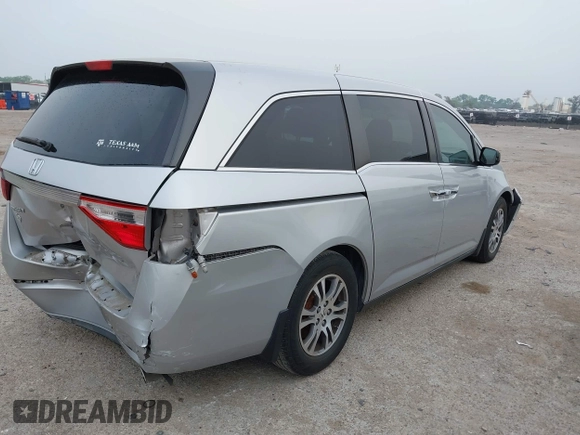 2012 Honda Odyssey EX with VIN 5FNRL5H41CB088288, listed as a IAAI auction lot 41926027 with 125,895 mi miles and . Bid and sale history available at carsss.com. Image 4.