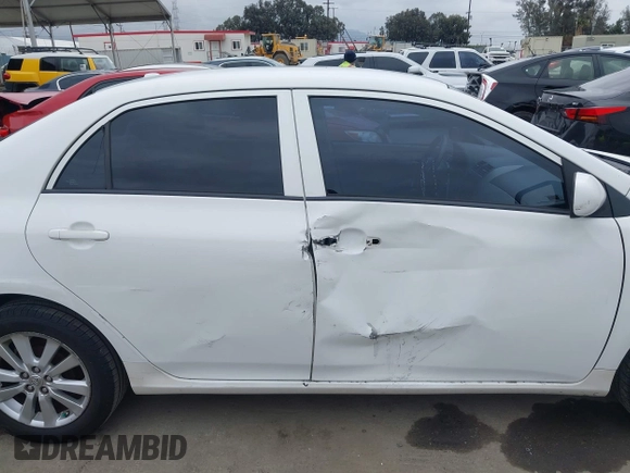 2010 Toyota Corolla with VIN 2T1BU4EE0AC359882, listed as a IAAI auction lot 42051633 with 227,481 mi miles. Bid and sale history available at carsss.com. Image 13.