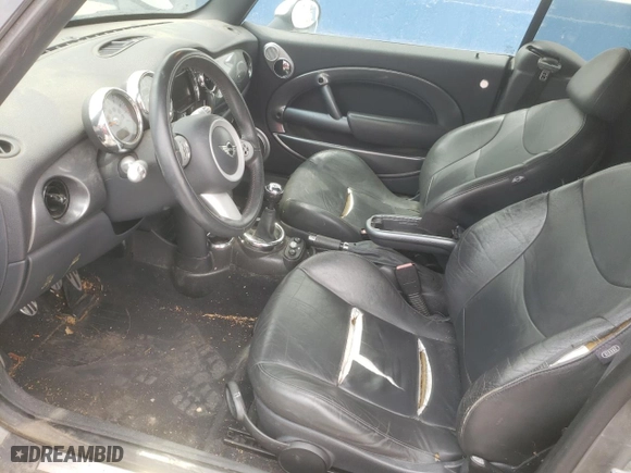 2007 MINI Cooper Convertible S with VIN WMWRH33587TJ43115, listed as a Copart auction lot 65467614 with 152,411 mi miles and Clean Title. Bid and sale history available at carsss.com. Image 7.