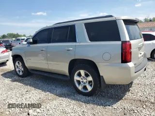 2016 Chevrolet Tahoe LT with VIN 1GNSKBKC7GR102138, listed as a Copart auction lot 57025525 with 165,439 mi miles and Salvage title. Bid and sale history available at DreamBid. Image 2.