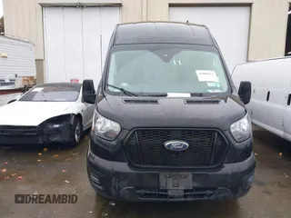 2022 Ford Transit Cargo z VIN 1FTBR3U85NKA64644, wystawiony jako IAAI lot #41006811 z przebiegiem 101 658 mil mil oraz . Historia ofert i sprzedaży dostępna na DreamBid. Obrazek 13.