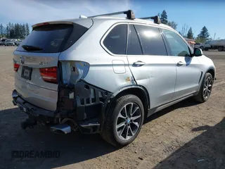 2018 BMW X5 xDrive35i with VIN 5UXKR0C52JL073889, listed as a IAAI auction lot 42035042 with 36,564 mi miles. Bid and sale history available at carsss.com. Image 4.