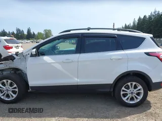 2018 Ford Escape SE with VIN 1FMCU9GD8JUB14879, listed as a IAAI auction lot 42156044 with 91,304 mi miles. Bid and sale history available at carsss.com. Image 15.