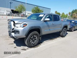 2016 Toyota Tacoma SR5 z VIN 3TMAZ5CNXGM019256, wystawiony jako IAAI lot #42294477 z przebiegiem 123 680 mil mil oraz . Historia ofert i sprzedaży dostępna na DreamBid. Obrazek 17.