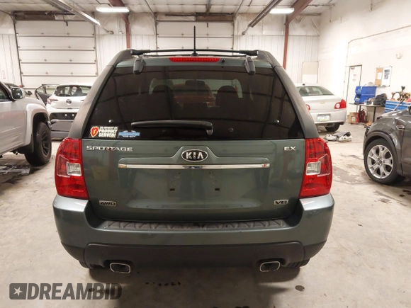 2009 Kia Sportage LX with VIN KNDJE723097558182, listed as a IAAI auction lot 41295142 with 147,200 mi miles. Bid and sale history available at carsss.com. Image 17.