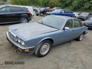 1989 Jaguar XJ with VIN SAJHY1540KC578115, listed as a Copart auction lot 69142274 with Not Provided miles and Clean Title. Bid and sale history available at DreamBid. Image 1.