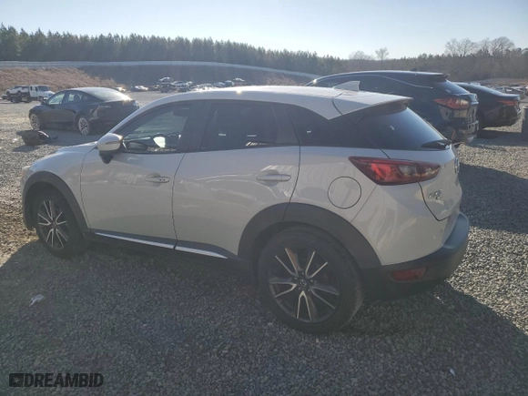 2016 Mazda CX-3 Grand Touring with VIN JM1DKBD70G0106540, listed as a Copart auction lot 45001355 with 233,341 mi miles and Salvage Title. Bid and sale history available at carsss.com. Image 2.