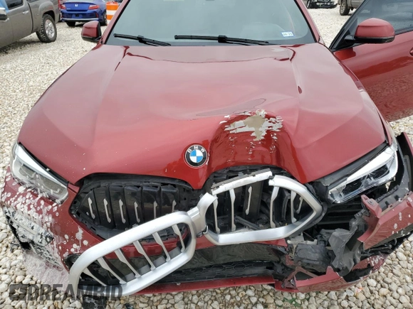 2021 BMW X6 sDrive40i z VIN 5UXCY4C01M9G08122, wystawiony jako Copart lot #44947865 z przebiegiem 90 011 mil mil oraz Szkody całkowita. Historia ofert i sprzedaży dostępna na DreamBid. Obrazek 14.