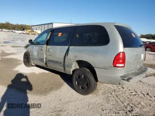 1999 Plymouth Voyager Grand SE z VIN 1P4GP44G1XB579504, wystawiony jako Copart lot #50064475 z przebiegiem Nie podano mil oraz Nie do naprawy. Historia ofert i sprzedaży dostępna na DreamBid. Obrazek 2.