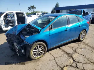 2017 Ford Focus SE with VIN 1FADP3F23HL203794, listed as a Copart auction lot 57202435 with 116,824 mi miles and Salvage title. Bid and sale history available at DreamBid. Image 1.