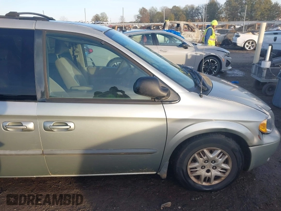 2003 Dodge Grand Caravan with VIN 2D4GP443X3R277421, listed as a IAAI auction lot 41035290 with 243,568 mi miles and . Bid and sale history available at DreamBid. Image 18.