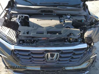 2025 Honda Pilot EX-L z VIN 5FNYG1H48SB083371, wystawiony jako Copart lot #49948825 z przebiegiem 4 772 mil mil oraz Szkoda całkowita • Salvage title. Historia ofert i sprzedaży dostępna na DreamBid. Obrazek 14.