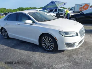 2017 Lincoln MKZ Hybrid Premiere с VIN 3LN6L5KU1HR631619, выставлен на аукционе IAAI как лот 39746492 с пробегом Не указан миль и . История ставок и продаж доступна на DreamBid. Изображение 16.