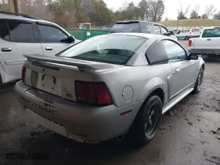 2001 Ford Mustang Standard with VIN 1FAFP40411F232997, listed as a IAAI auction lot 41560523 with 234,743 mi miles. Bid and sale history available at carsss.com. Image 4.