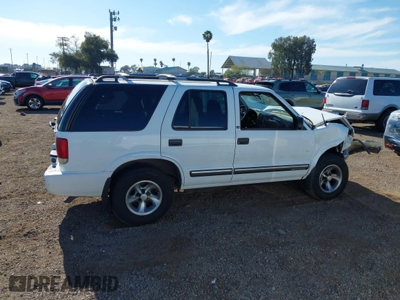 2001 Chevrolet Blazer LT z VIN 1GNCS13W712122865, wystawiony jako IAAI lot #41997035 z przebiegiem 161 862 mil mil oraz . Historia ofert i sprzedaży dostępna na DreamBid. Obrazek 13.