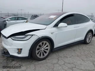 2016 Tesla Model X 70D with VIN 5YJXCBE2XGF013295, listed as a IAAI auction lot 41862736 with 96,190 mi miles. Bid and sale history available at carsss.com. Image 2.