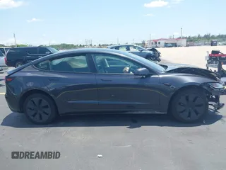 2025 Tesla Model 3 Long Range with VIN 5YJ3E1EA0SF903825, listed as a IAAI auction lot 42197820 with 4,944 mi miles and . Bid and sale history available at DreamBid. Image 13.