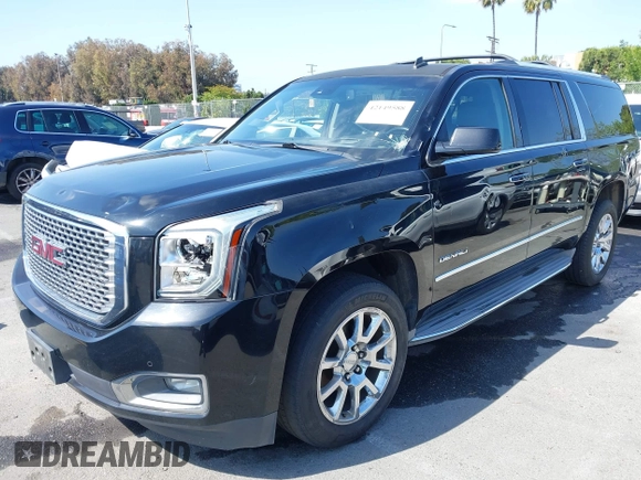 2015 GMC Yukon XL Denali with VIN 1GKS1JKJ1FR134428, listed as a IAAI auction lot 42149588 with 116,207 mi miles. Bid and sale history available at carsss.com. Image 2.