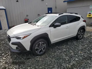 2025 Subaru Crosstrek Premium с VIN JF2GUHDCXS8231872, выставлен на аукционе Copart как лот 57392835 с пробегом 752 миль миль и Списание • Salvage title. История ставок и продаж доступна на DreamBid. Изображение 1.