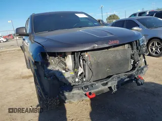 2018 Jeep Grand Cherokee Trailhawk with VIN 1C4RJFLT9JC244212, listed as a IAAI auction lot 41443469 with 77,953 mi miles and . Bid and sale history available at DreamBid. Image 6.