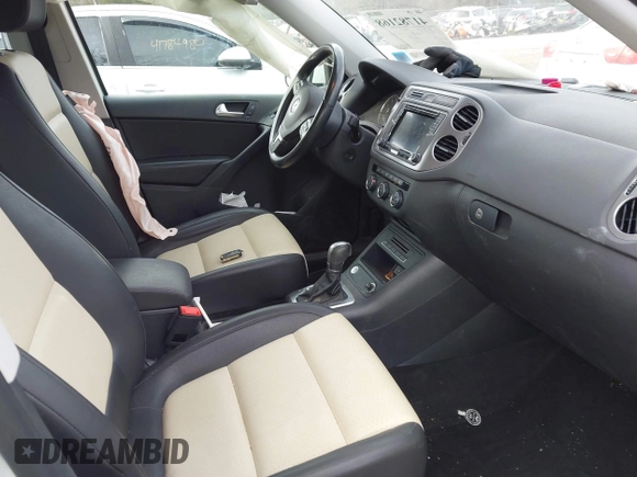 2017 Volkswagen Tiguan S with VIN WVGBV7AX3HK020883, listed as a IAAI auction lot 41782168 with 87,650 mi miles and . Bid and sale history available at DreamBid. Image 5.