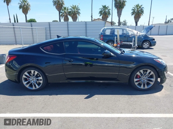 2013 Hyundai Genesis Coupe Track z VIN KMHHU6KJ6DU089065, wystawiony jako IAAI lot #42224509 z przebiegiem 104 918 mil mil oraz . Historia ofert i sprzedaży dostępna na DreamBid. Obrazek 13.