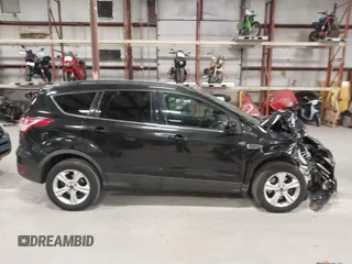 2015 Ford Escape SE with VIN 1FMCU9G97FUA21287, listed as a IAAI auction lot 41990144 with 55,036 mi miles and . Bid and sale history available at DreamBid. Image 14.