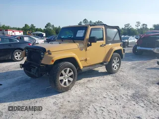 2013 Jeep Wrangler Arctic z VIN 1C4GJWBG2DL634942, wystawiony jako IAAI lot #42373239 z przebiegiem 131 470 mil mil oraz . Historia ofert i sprzedaży dostępna na DreamBid. Obrazek 18.