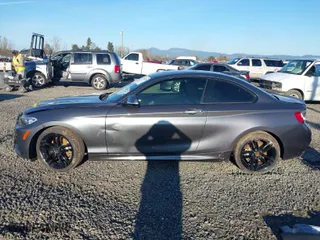 2016 BMW 2 Series 228i with VIN WBA1F9C52GV545125, listed as a IAAI auction lot 41692429 with 89,183 mi miles. Bid and sale history available at carsss.com. Image 15.