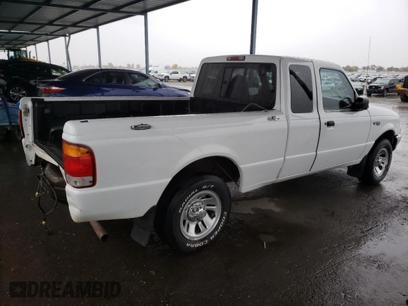 1999 Ford Ranger XLT with VIN 1FTYR14X3XPB21905, listed as a Copart auction lot 82248924 with 273,376 mi miles and Salvage Title. Bid and sale history available at DreamBid. Image 3.