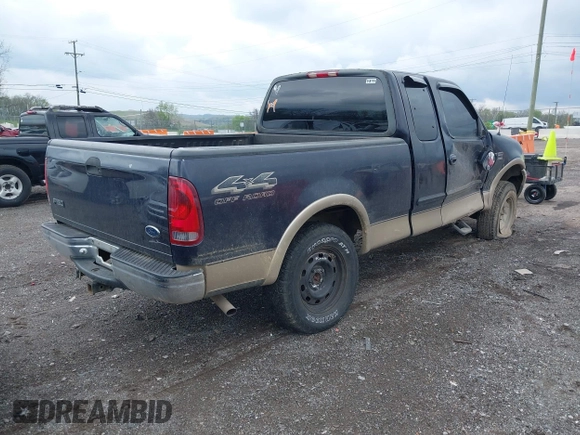 2000 Ford F-150 XL with VIN 1FTRX18L1YNA08999, listed as a IAAI auction lot 41988747 with 214,201 mi miles. Bid and sale history available at carsss.com. Image 4.