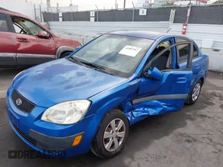 2008 Kia Rio LX with VIN KNADE123486365738, listed as a IAAI auction lot 41902367 with 248,194 mi miles. Bid and sale history available at carsss.com. Image 2.