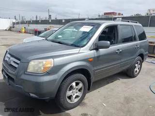 2007 Honda Pilot EX-L with VIN 5FNYF28507B007040, listed as a IAAI auction lot 42038302 with 251,262 mi miles. Bid and sale history available at carsss.com. Image 2.