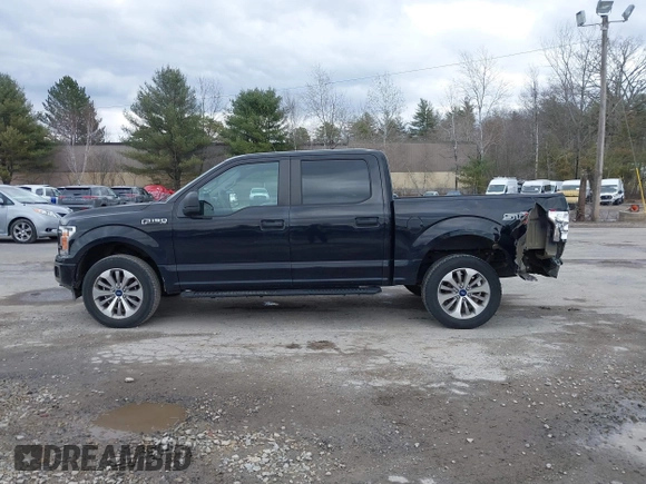 2018 Ford F-150 XL with VIN 1FTEW1EP2JFC58602, listed as a IAAI auction lot 41861045 with 149,399 mi miles. Bid and sale history available at carsss.com. Image 14.