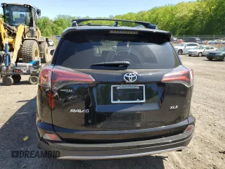 2018 Toyota RAV4 XLE with VIN 2T3WFREVXJW471443, listed as a Copart auction lot 54890655 with 131,677 mi miles and Salvage title. Bid and sale history available at DreamBid. Image 6.